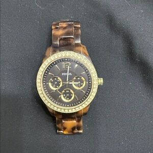 Fossil women’s Black and Gold Tortoise Watch